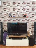 ตัวอย่างติดวอลเปเปอร์ลายก้อนอิฐ สีน้ำตาลม่วง ย่านพุทธมณฑล สาย4