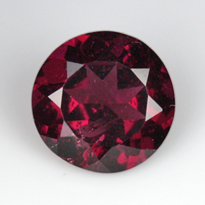 **ขายแล้ว**โกเมนสีม่วงเเดงหรือโรโดไลท์ (Rhodolite Garnet) 0.99 กะรัต ม่วงเเดงเข้ม
