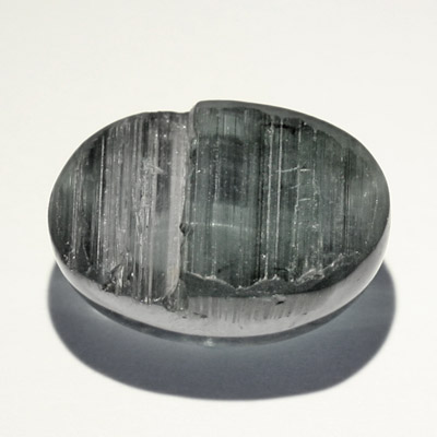 ทัวร์มาลีนตาแมว (Cat's eye Tourmaline) 6.26 กะรัต สีเทาติดเขียว หายาก