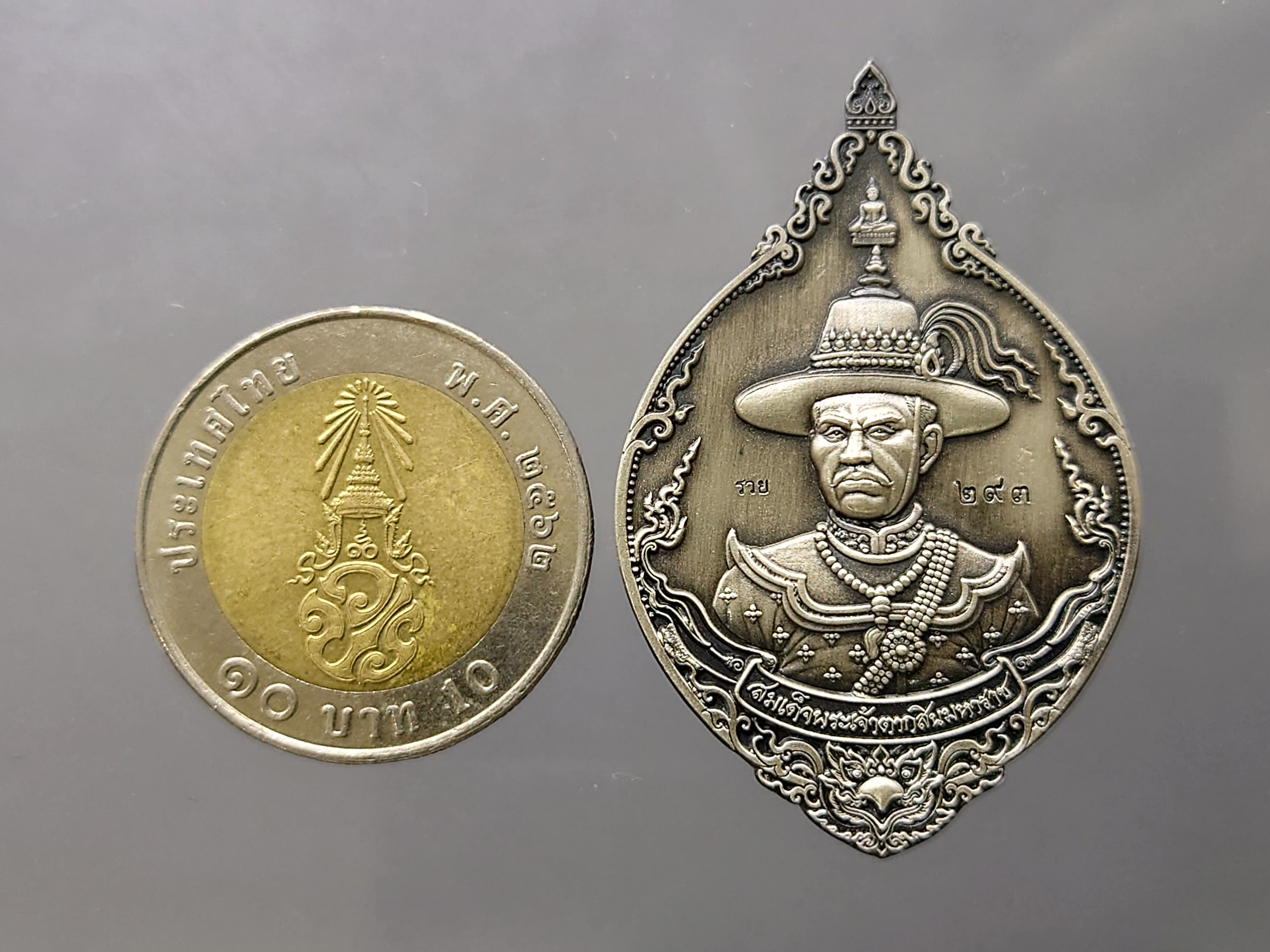 เหรียญสมเด็จพระเจ้าตากสิน เนื้อเงินซาติน รุ่น ชนะศึกปราบไพรี วัดพรานนก อยุธยา ปี2562 เลขโคท 293 (สร้าง 999 ออกจอง 2800) ตลับเดิม