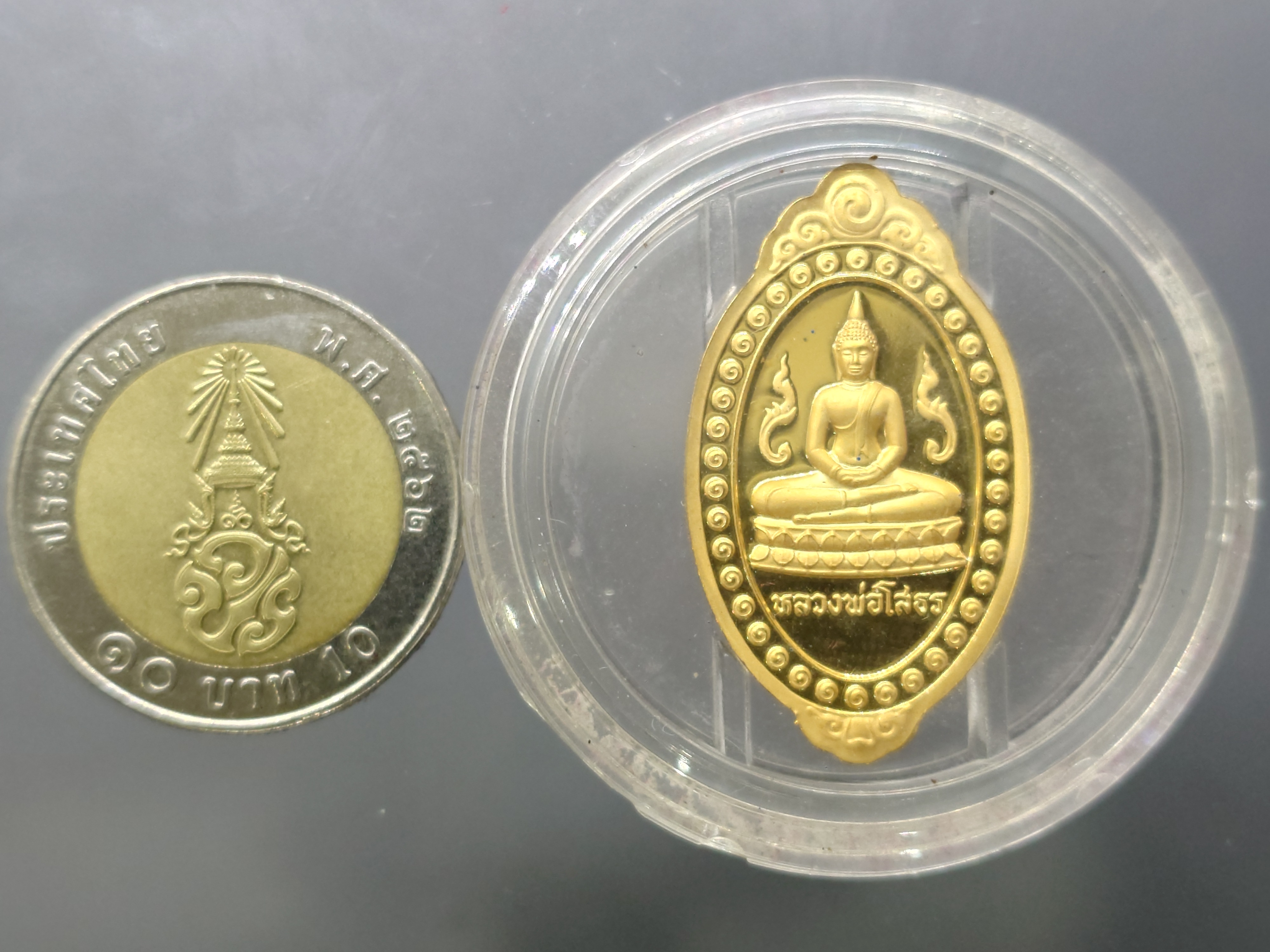 หลวงพ่อโสธร รุ่นสร้างพระอุโบสถ เนื้อทองแดงขัดเงาพ่นทรายชุบทอง พิธีพุทธาภิเษก ณ วัดโสธรวราราม ปี2543 พร้อมกล่องเดิม