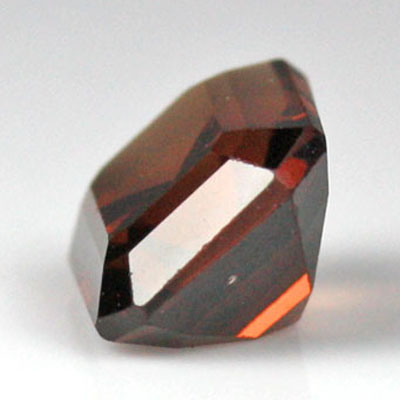 สปิเนลสีส้มน้ำตาล (Spinel) 1.44 กะรัต รูปเหลี่ยมมรกต รูปร่างดี