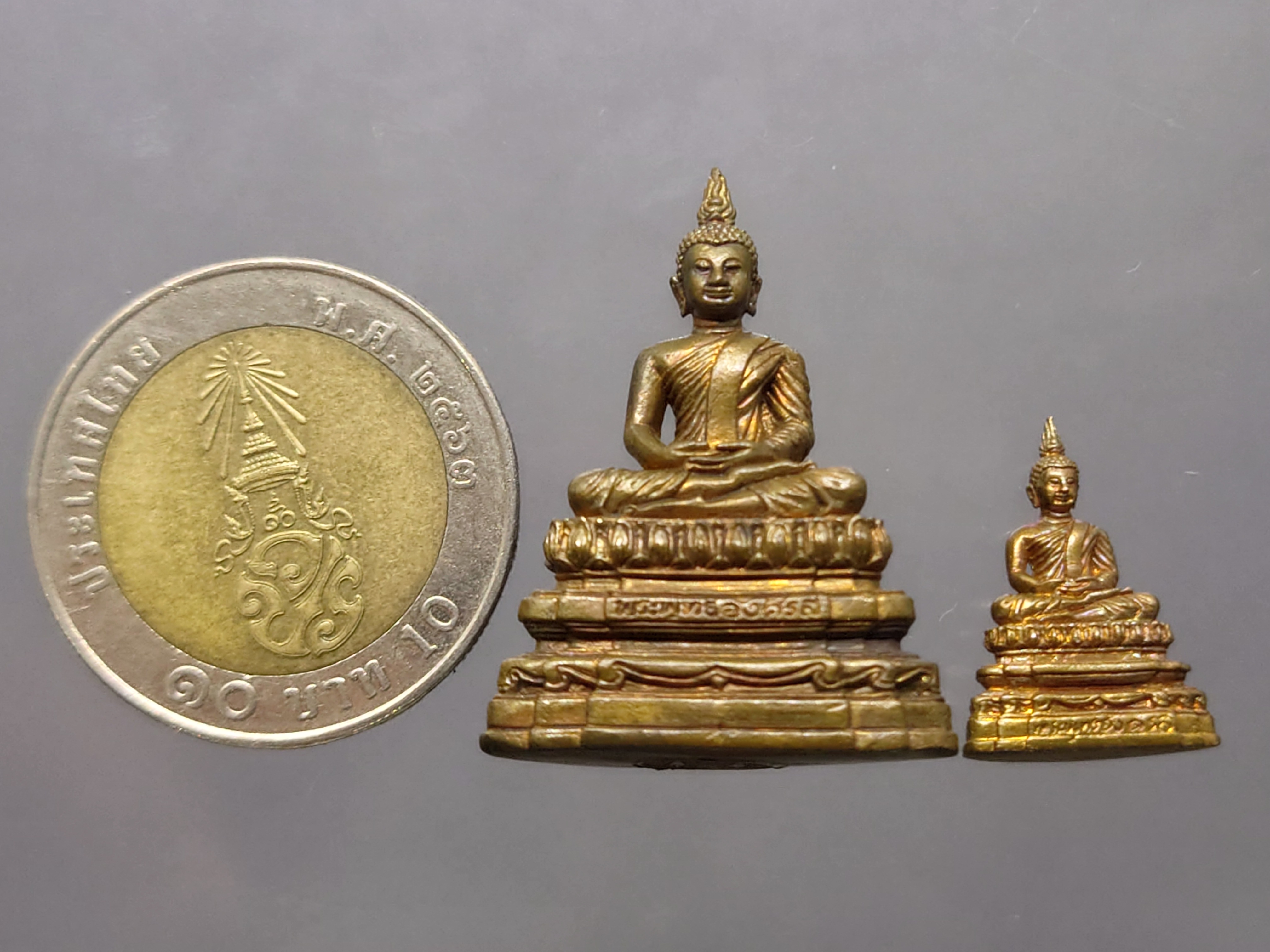 พระกริ่ง-พระชัยวัฒน์ พระพุทธอังคีรส เนื้อโลหะผสม วัดราชบพิธสถิตมหาสีมาราม ปี2554 พร้อมกล่องเดิม