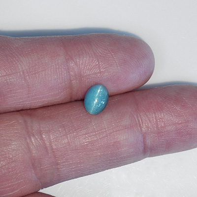 อะพาไทท์ตาแมว (Cat's eye Apatite) 1.50 กะรัต สีฟ้าอมเขียว
