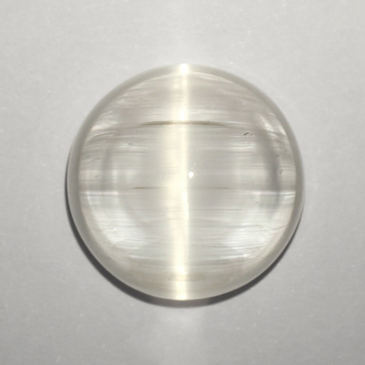**ขายแล้ว**โทปาสตาแมว (Cat's eye Topaz) 22.12 กะรัต ตาแมวไหมสีเงิน หายาก เม็ดใหญ่