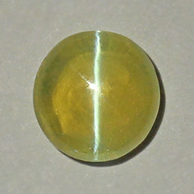 **ขายแล้ว**คริสโซเบริลตาแมวหรือไพฑูรย์ (Cat's eye Chrysoberyl) 1.76 กะรัต เนื้อเนียน ตาคม จากศรีลังกา