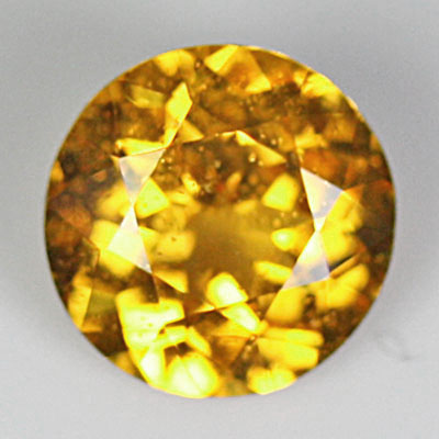 **ขายแล้ว**โกเมนสีเหลืองหรือสเปซซาไทท์แมนดาริน (Spessartite/Mandarin Garnet) 1.56 กะรัต รูปกลม สีเหลืองแมนดาริน หายาก