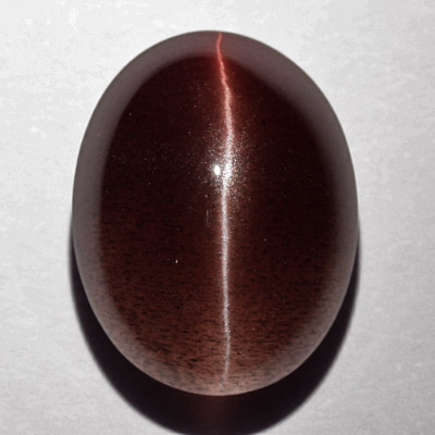 **ขายแล้ว**สคาโพไลท์ตาแมว (Cat's eye Scapolite) 14.94 กะรัต สีเลือดหมู เม็ดโต