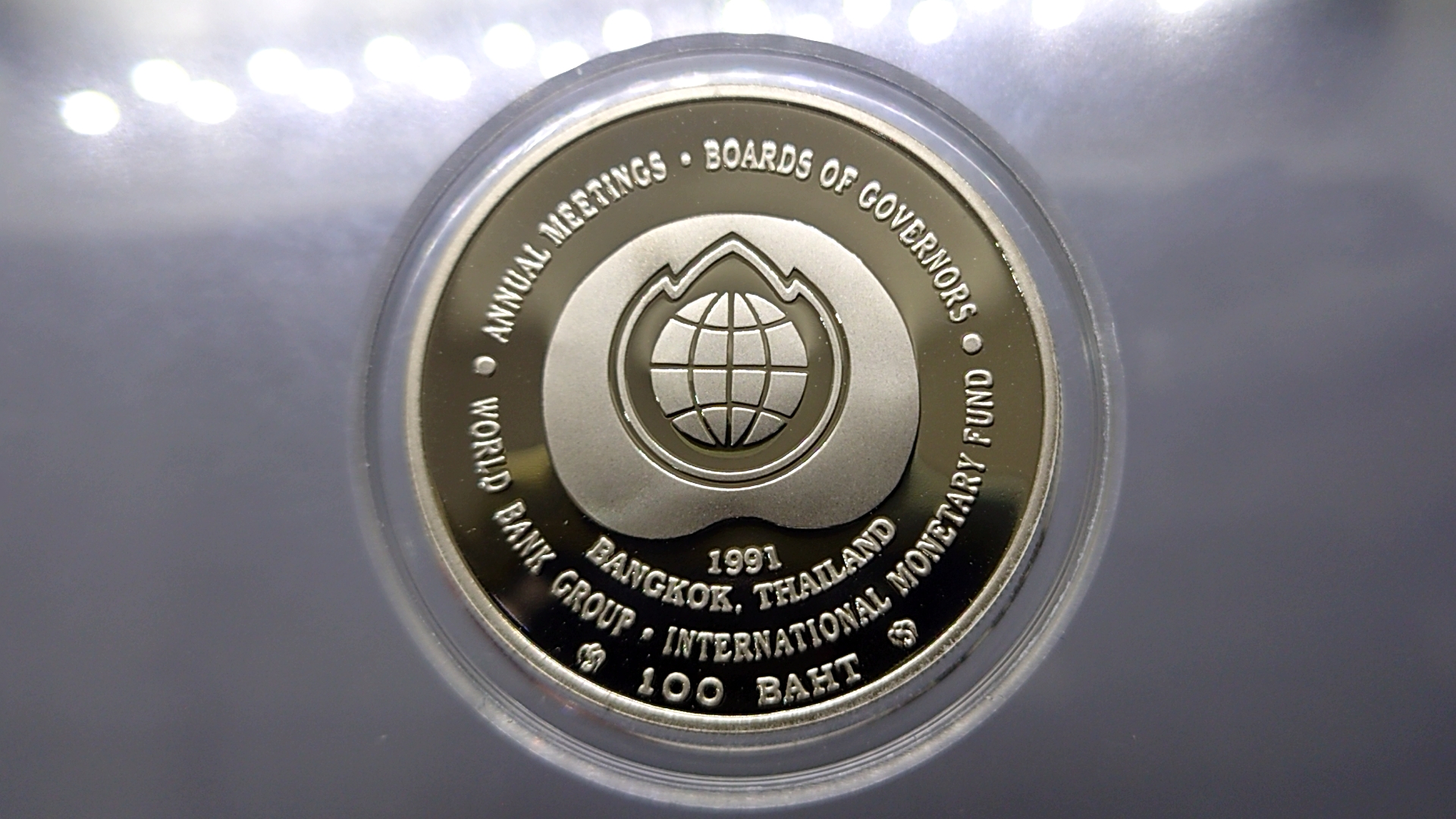 เหรียญ 100 บาท นิเกิลขัดเงา ที่ระลึกเวิร์ลแบ็งค์ ปี2534