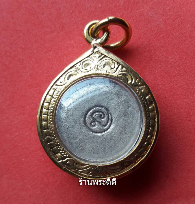 พระปิดตาหลวงปู่ทิม เนื้อกะไหล่เงิน (พร้อมเลี่ยมกรอบทองไมครอน)