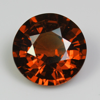 **ขายแล้ว**โกเมนสีส้มหรือสเปซซาไทท์ (Spessartite Garnet) 3.30 กะรัต เหลี่ยมกลม สะอาด ไฟดี