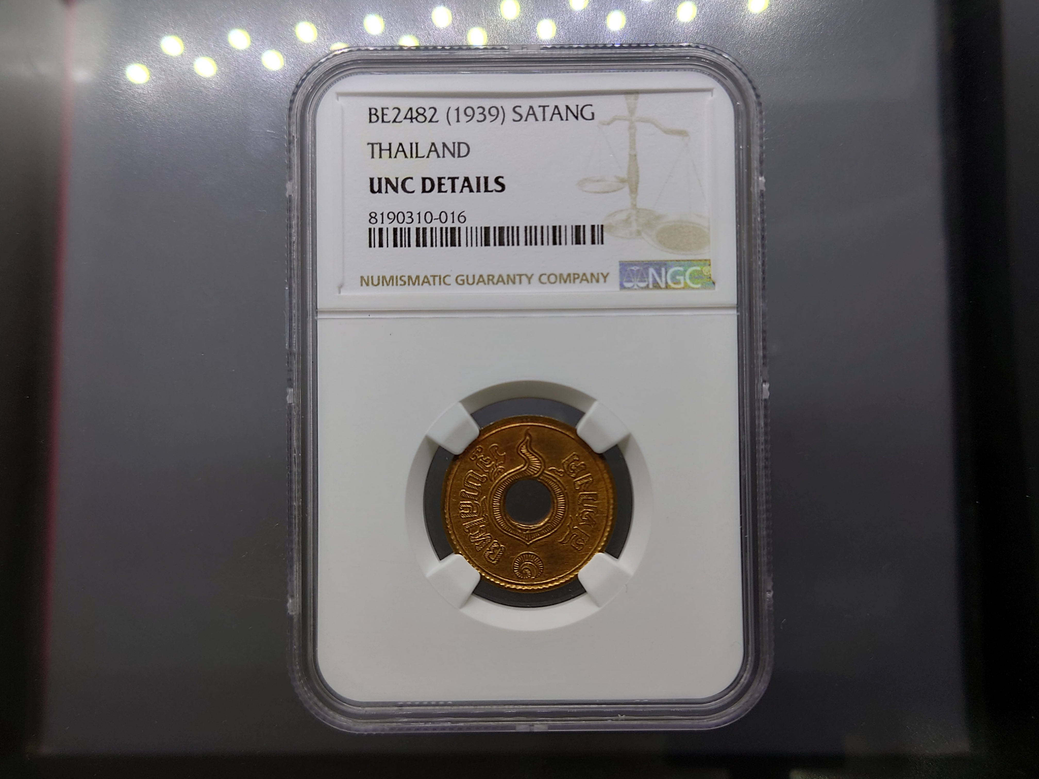 เหรียญเกรดดิ้ง เหรียญ 1 สตางค์ รู ทองแดง ปี 2482 UNC DETAIL NGC