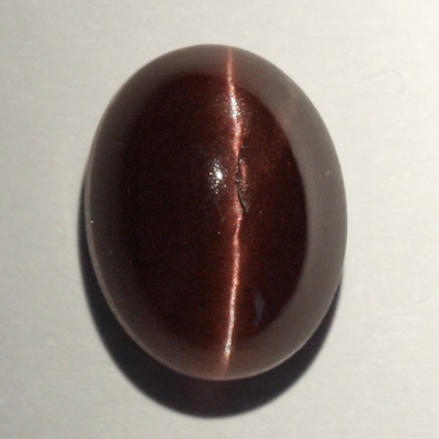 **ขายแล้ว**สคาโพไลท์ตาแมว (Cat's eye Scapolite) 5.22 กะรัต สีเลือดหมู ตาคม