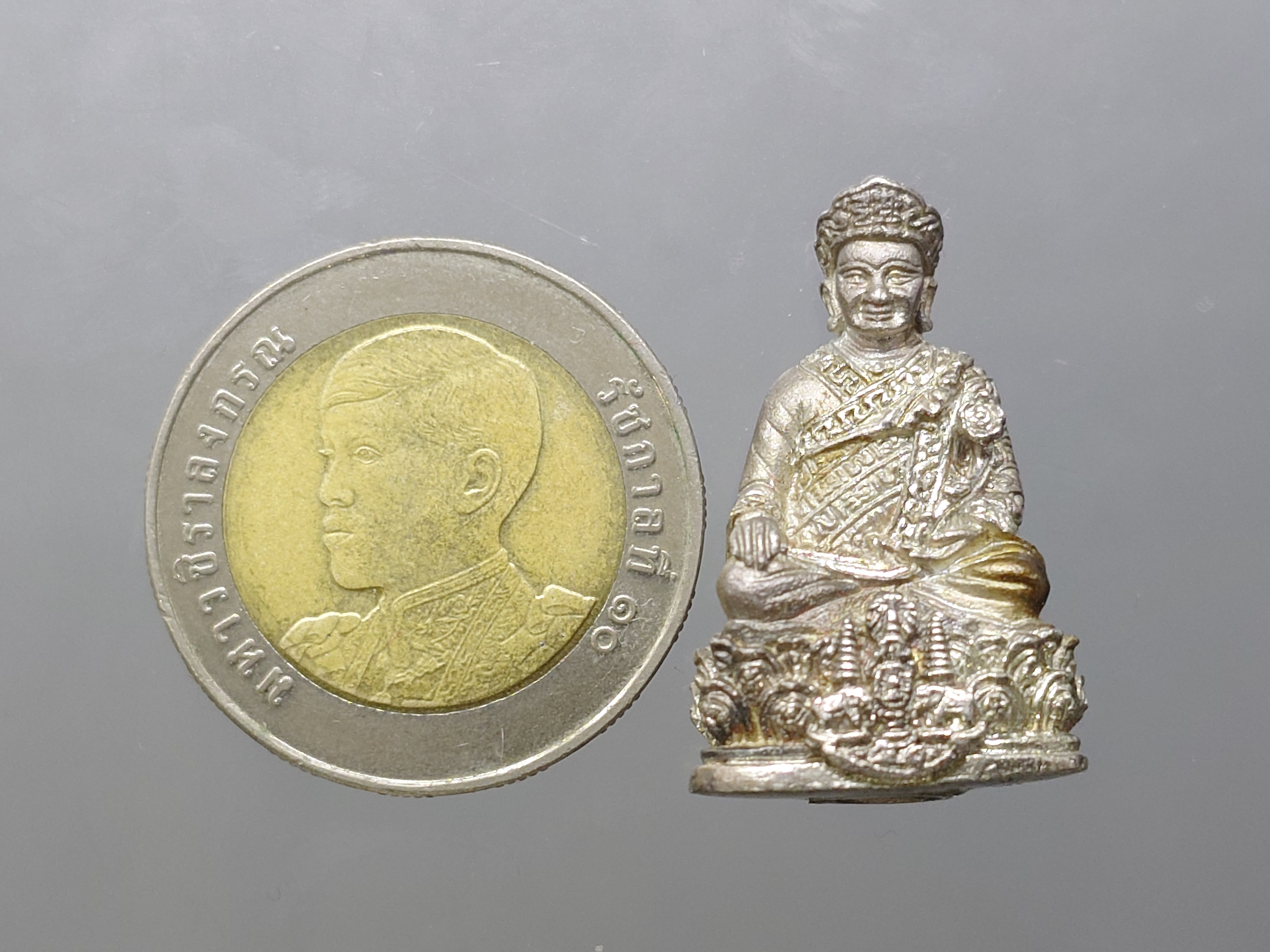 หลวงปู่ไต้ฮงกง เนื้อเงิน รุ่นกาญจนาภิเษก จัดสร้างโดย มูลนิธิปอเต็กตึ๊ง ปี2539 นิยม หายาก