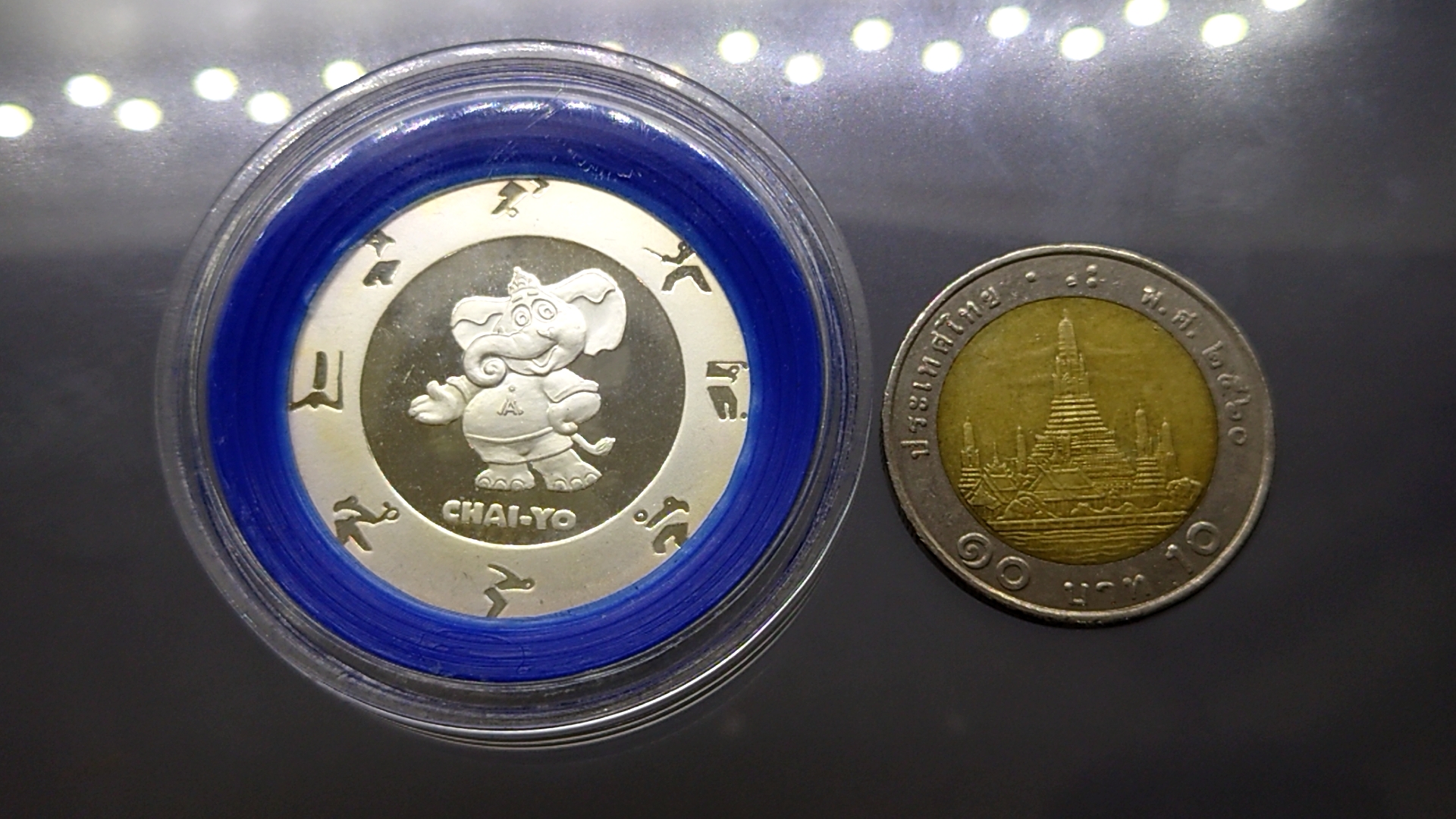 เหรียญโลหะเคลือบเงิน ขัดเงา ที่ระลึกเอเชี่ยนเกมส์ ครั้งที่ 13 ขนาด 3.3 เซ็น 2541 พร้อมกล่องเดิม ใบเซอร์