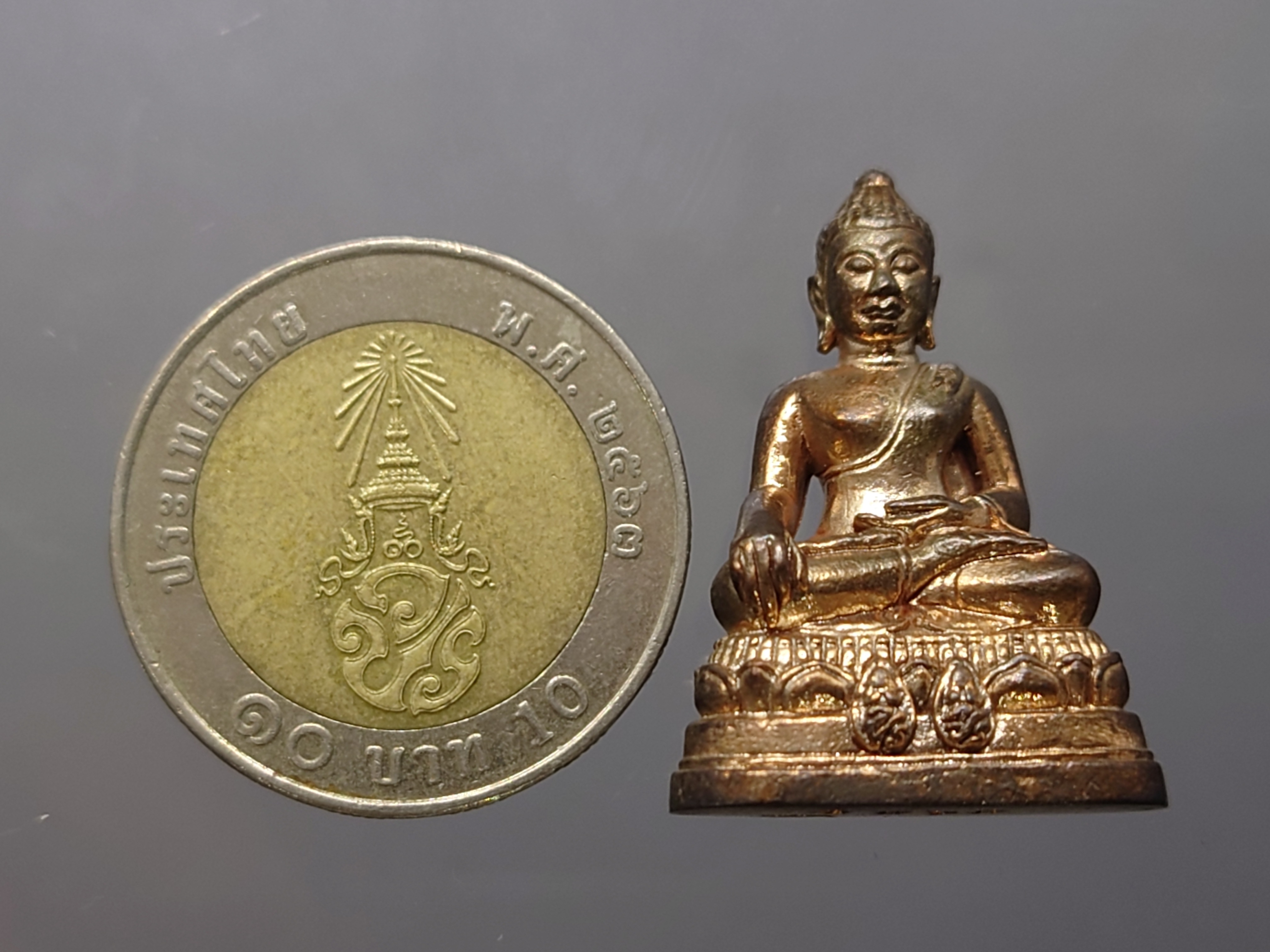 พระกริ่งพระพุทธนรสีห์ จำลอง จปร-ภปร เนื่องในโอกาสครบ 100 ปี ธนาคารไทยพาณิชย์ เนื้อนวะโลหะ พ.ศ.2550 พร้อมกล่องเดิม