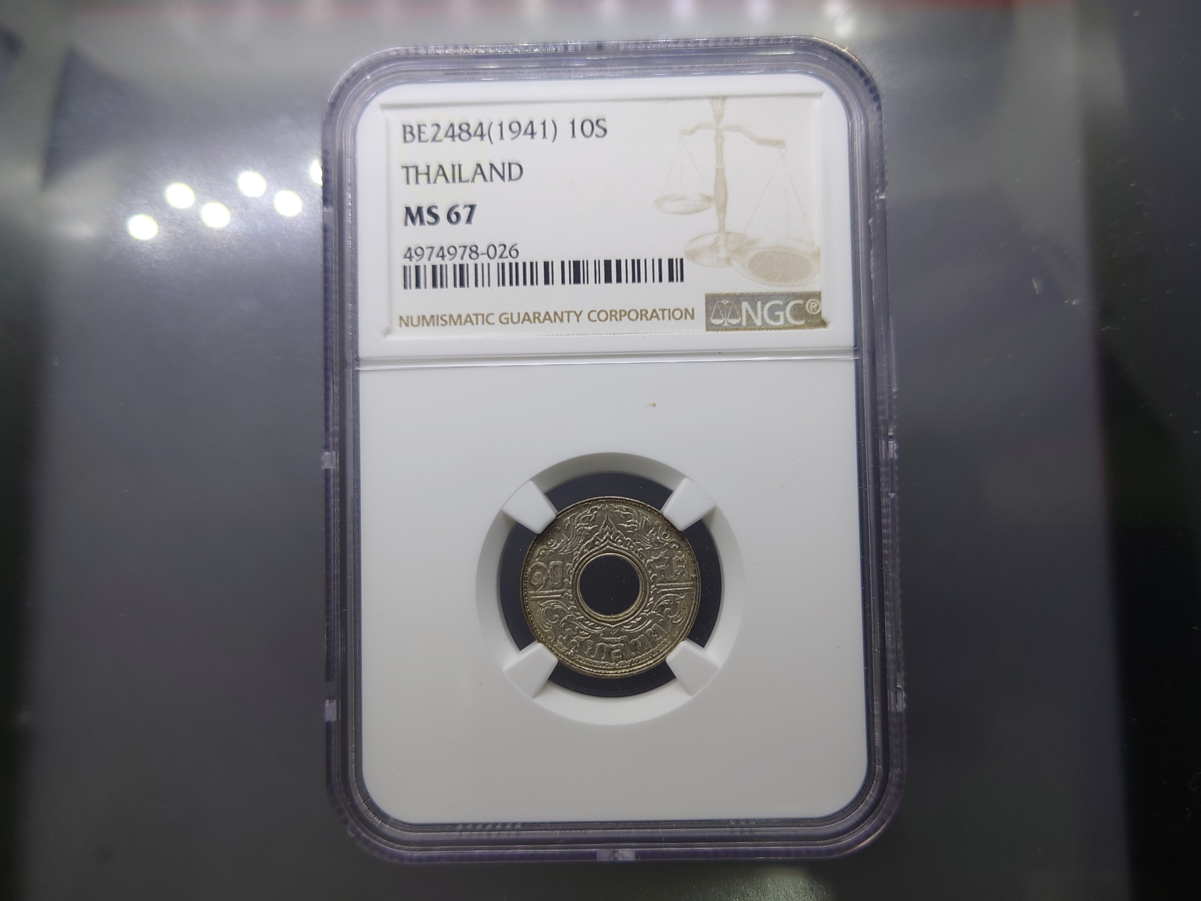 เหรียญเกรด เหรียญเงิน สตางค์รู 10 สตางค์ ลายกนกแข้งสิงห์ ไม่ผ่านใช้ เกรด MS67 NGC ปี2484