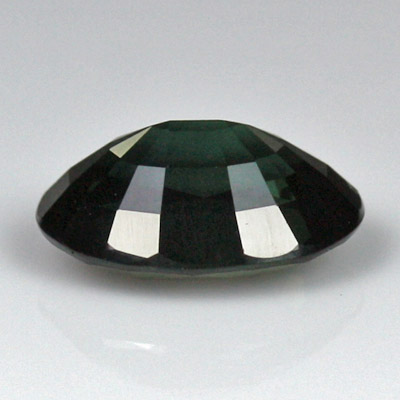 **ขายแล้ว**เขียวส่อง (Green Sapphire) 1.65 กะรัต สีเขียวเข้ม ประกายดี พลอยบางกะจะ