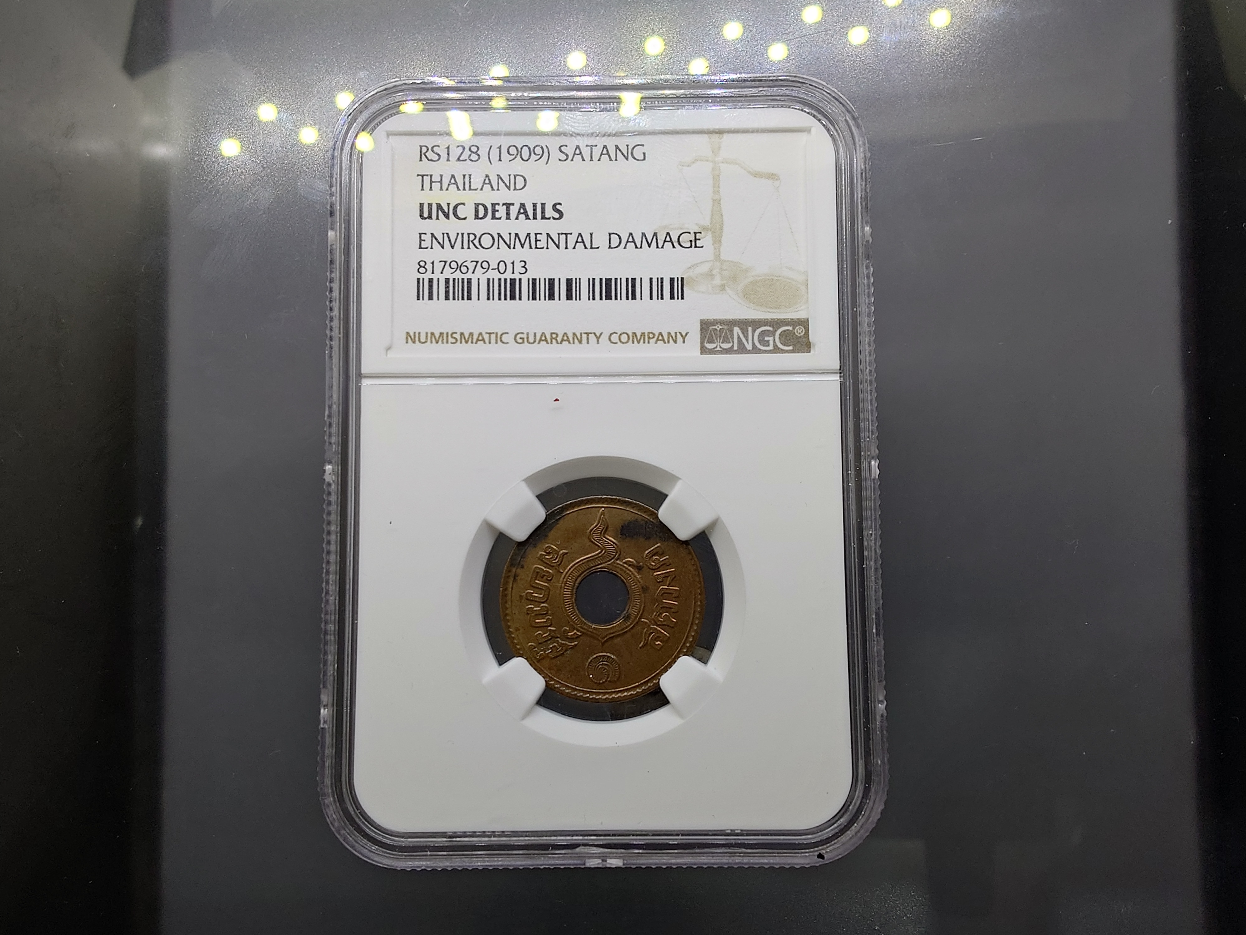 เหรียญเกรดดิ้ง 1 สตางค์ รู ทองแดง ร.ศ.128 UNC DETAILS NGC