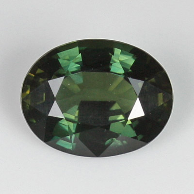**ขายแล้ว**เขียวส่อง (Green Sapphire) 1.65 กะรัต สีเขียวเข้ม ประกายดี พลอยบางกะจะ