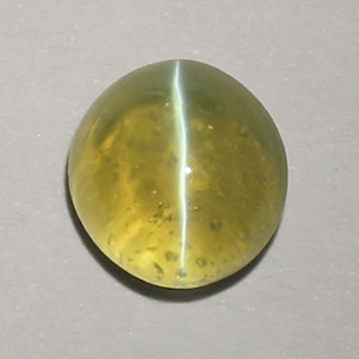 **ขายแล้ว**คริสโซเบริลตาแมวหรือไพฑูรย์ (Cat's eye Chrysoberyl) 1.78 กะรัต เนื้อใส ตาคม จากศรีลังกา
