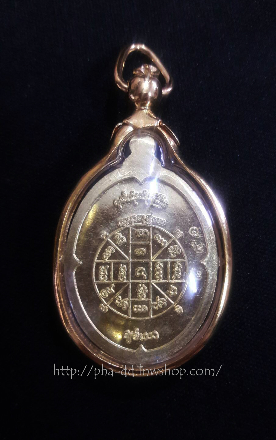 เหรียญเทพทันใจ เนื้อกะไหล่ทองลงยาม่วง เลี่ยมกรอบทองไมครอน พร้อมกล่องกำมะหยี่