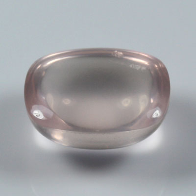 โรสควอตซ์ (Rose Quartz) 10.54 กะรัต รูปคูชั่นหลังเบี้ย สีชมพู
