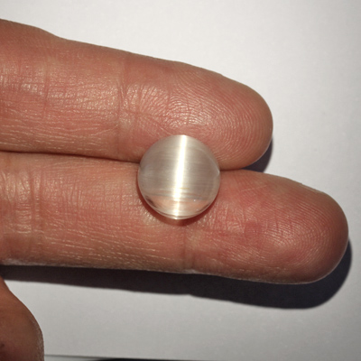 **ขายแล้ว**โทปาสตาแมว (Cat's eye Topaz) 13.97 กะรัต ตาแมวไหมสีเงิน หายาก
