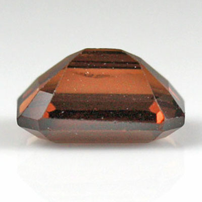 สปิเนลสีส้มน้ำตาล (Spinel) 1.44 กะรัต รูปเหลี่ยมมรกต รูปร่างดี