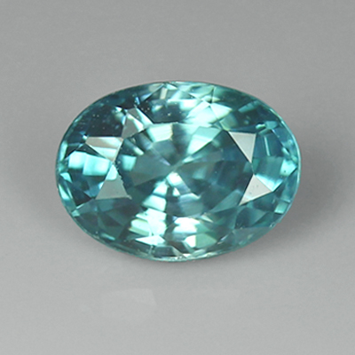 เพทายสีฟ้า (Blue Zircon) 1.38 กะรัต รูปไข่ สีฟ้าอมเขียว