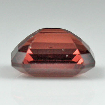 **ขายแล้ว**สปิเนลสีส้มน้ำตาลอมแดง (Spinel) 1.49 กะรัต รูปเหลี่ยมมรกต รูปร่างดี