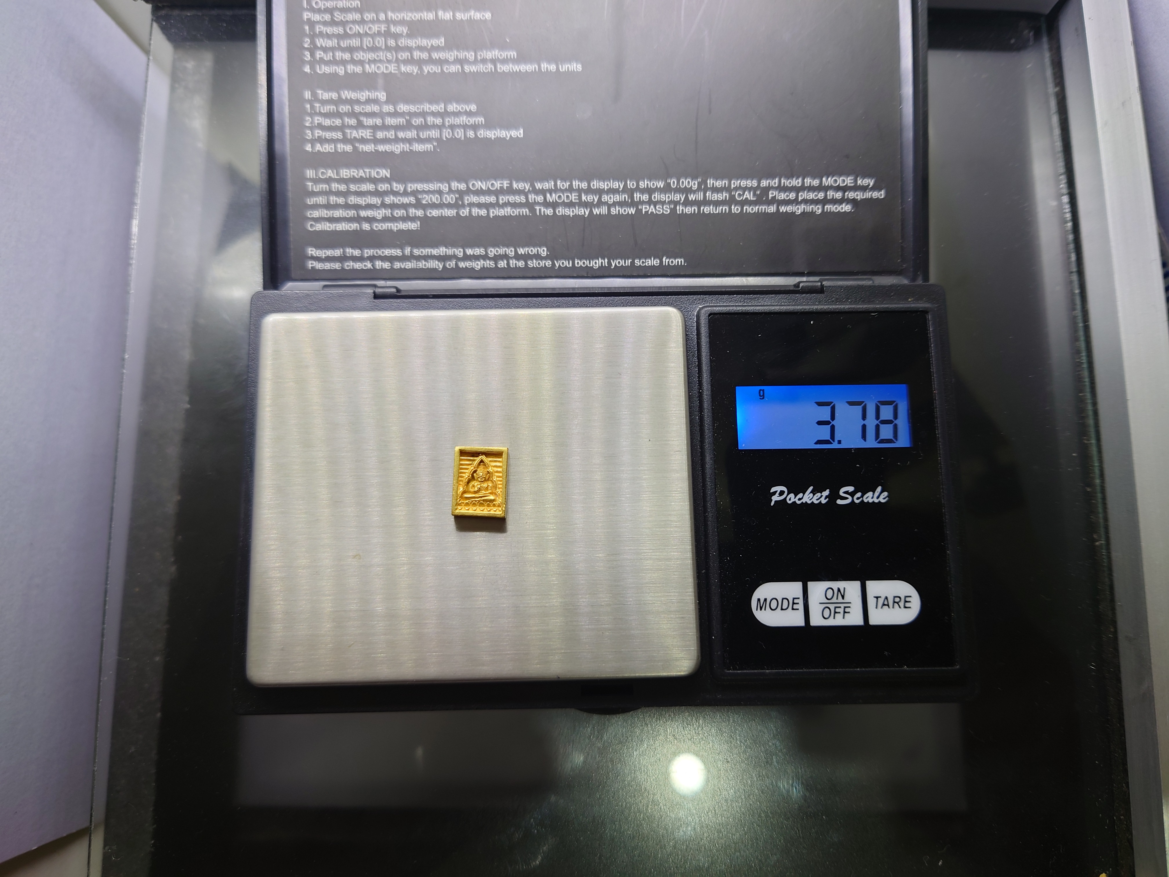 พระของขวัญวัดปากน้ำ เนื้อทองคำ (หนัก 3.78 กรัม) รุ่นซื้อที่ดินถวาย(พิมพ์มหาปฐพี) พิมพ์เล็ก วัดปากน้ำ 2534