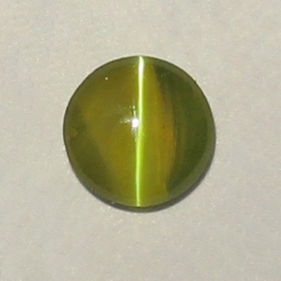 **ขายแล้ว**คริสโซเบริลตาแมวหรือไพฑูรย์ (Cat's eye Chrysoberyl) 0.31 กะรัต เม็ดเล็ก เหมาะสำหรับนำไปใส่แหวนนพเก้า