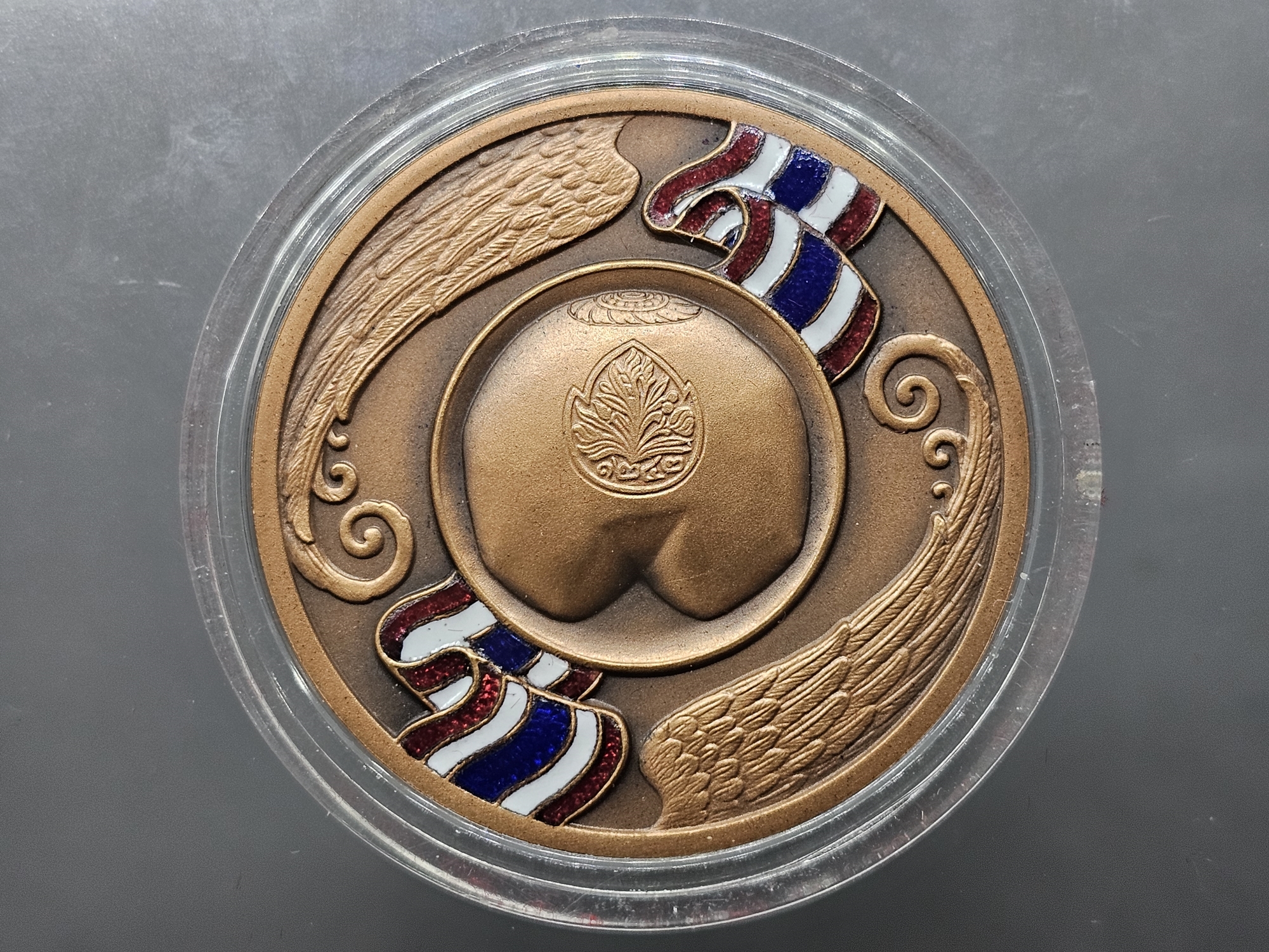 เหรียญเหรียญที่ระลึกการประชุมโรงกษาปณ์ในกลุ่มประเทศอาเซียน (TEMAN) ครั้งที่ 16 ปี 2556 เนื้อทองแดง พร้อมกล่องและใบเซอร์