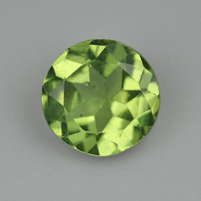 เพอริโด (Peridot) 0.44 กะรัต สีเขียวอมเหลือง รูปร่างกลม