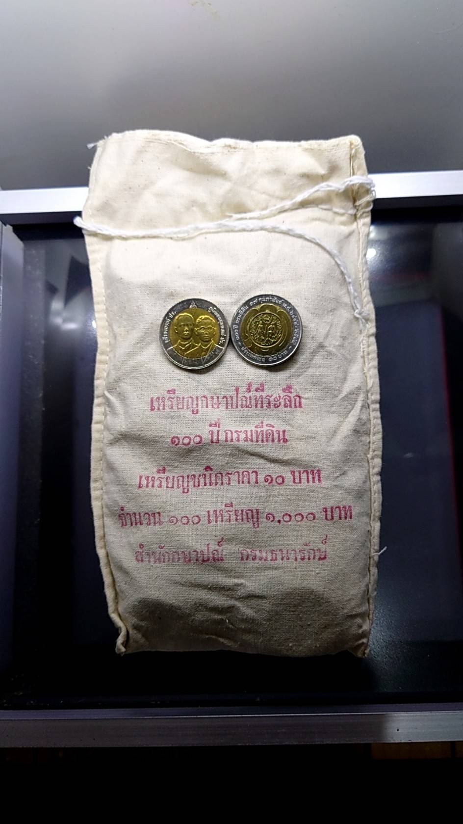 เหรียญยกถุง (100 เหรียญ) เหรียญ 10 บาท สองสี ที่ระลึกครบ 100 ปี กรมที่ดิน ปี2544 ไม่ผ่านใช้