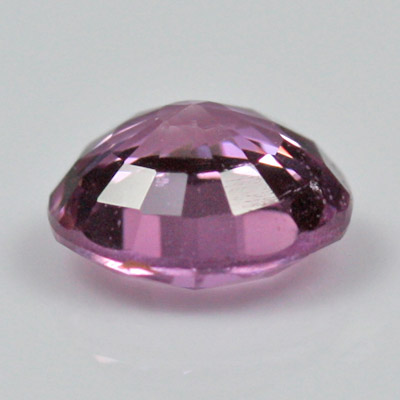 แซปไฟร์สีชมพู (Pink Sapphire) 0.84 กะรัต สีชมพูอมม่วงเล็กน้อย รูปร่างกลม
