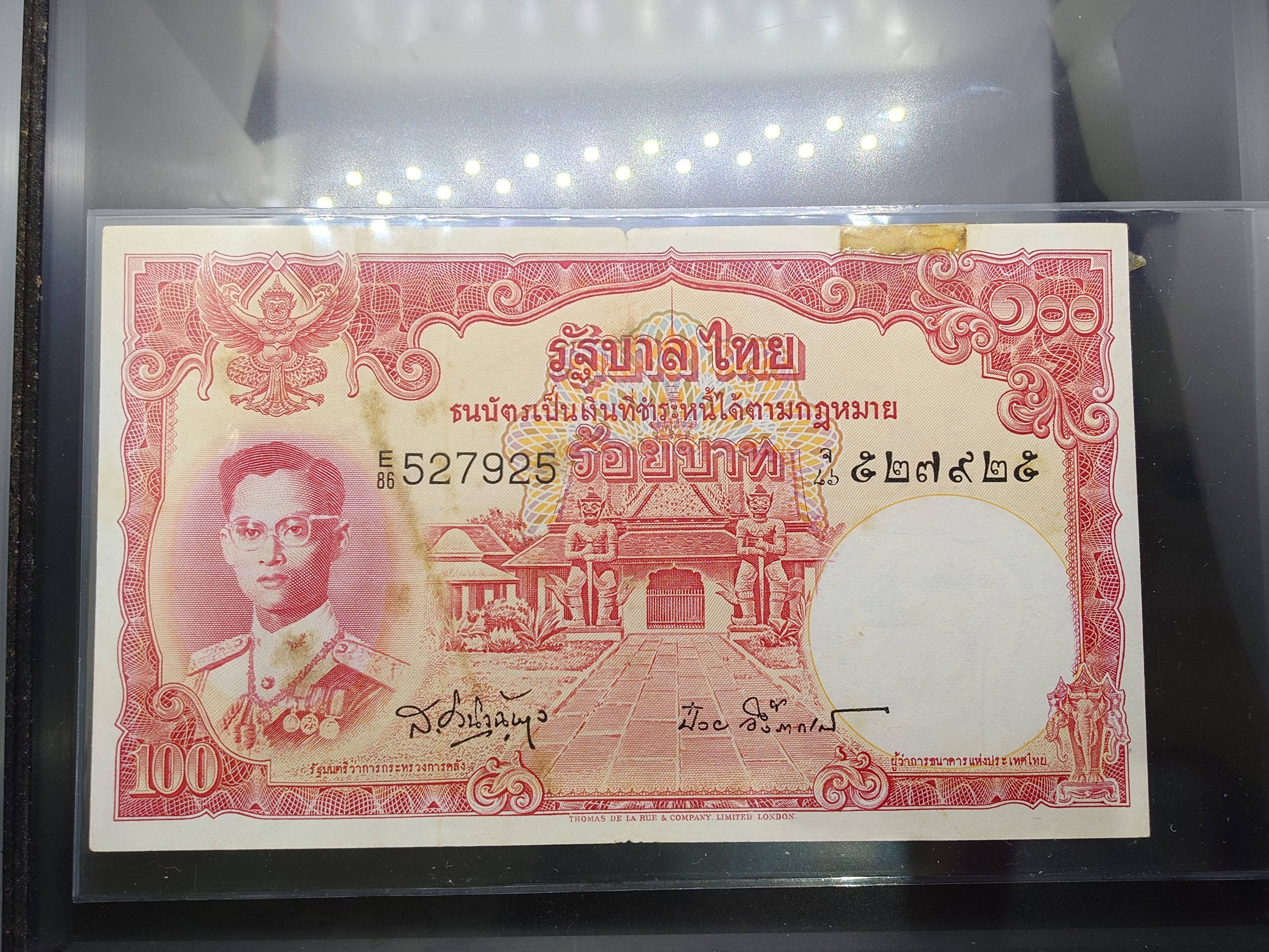 ธนบัตร 100 บาท แบบ 9 รุ่น 4 (โทมัส) ผ่านใช้ (ราคาต่อ 1 ใบ) สภาพมีปริขอบ มีรู มีแหว่ง มีคราบ งดเลือก