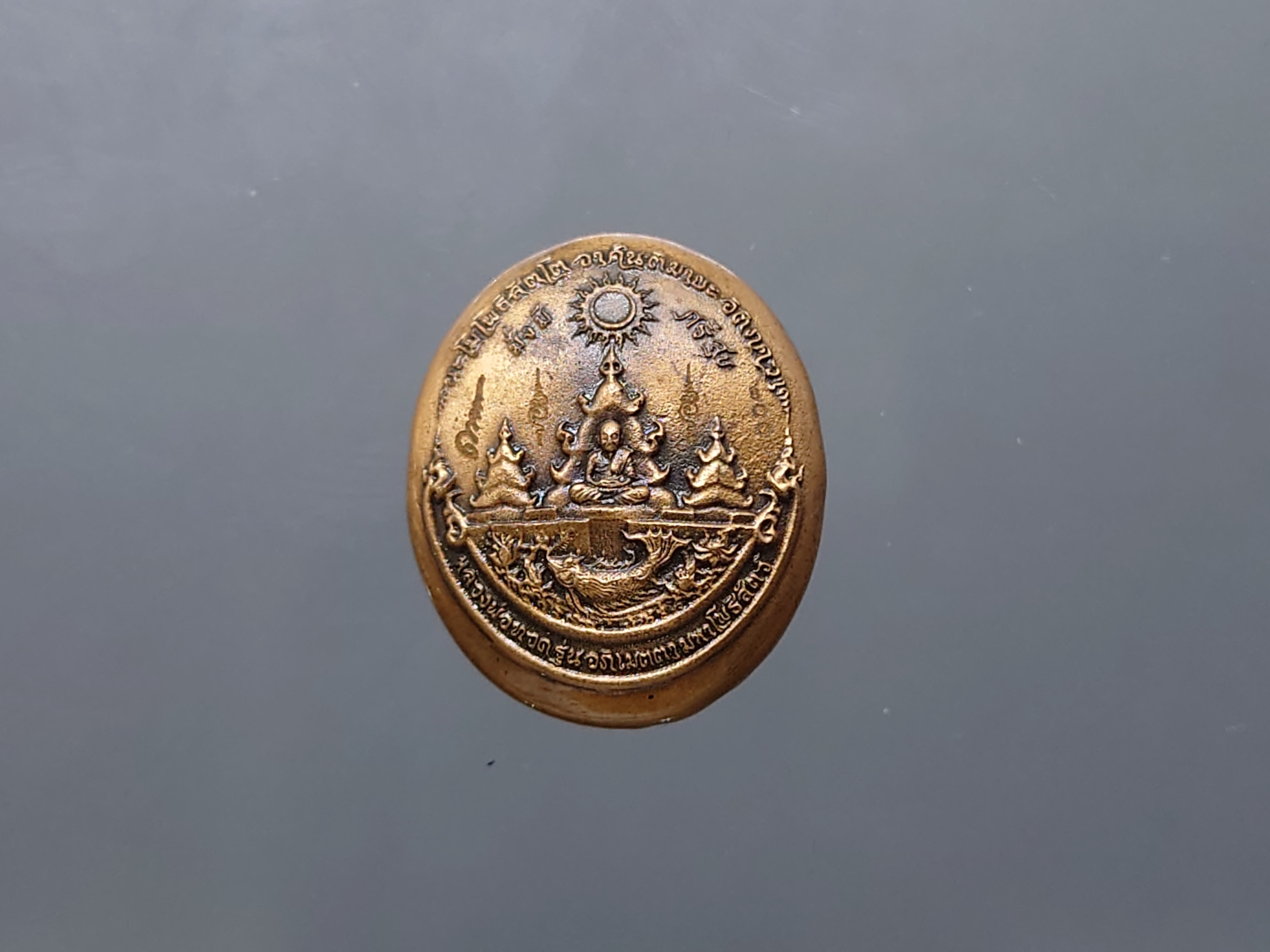 เหรียญหลวงปู่ทวด รุ่นอภิเมตรา มหาโพธิสัตว์ พิมพ์จิ๋ว เนื้อทองแดงนอก (แยกชุดกรรมการ โคท ๒๐๐๐) ควบคุมออกแบบโดย อ.เฉลิมชัย พ.ศ.2558