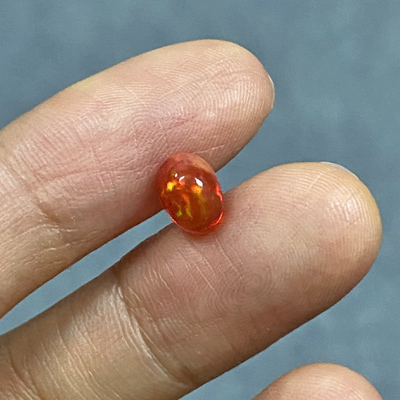 **ขายแล้ว**โอปอลไฟ (Fire Opal) จากเม็กซิโก 1.00 กะรัต สีส้มอมแดง