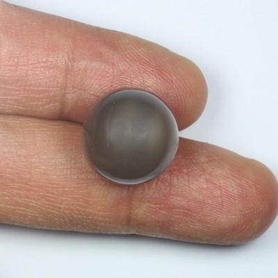 **ขายแล้ว**มูนสโตน หรือ มุกดาหาร (Moonstone) 24.17 กะรัต สีเทาอมน้ำตาล ทรงกลม