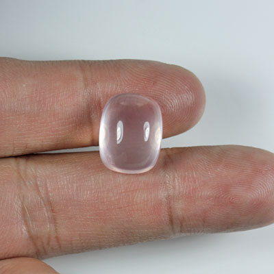 โรสควอตซ์ (Rose Quartz) 10.54 กะรัต รูปคูชั่นหลังเบี้ย สีชมพู