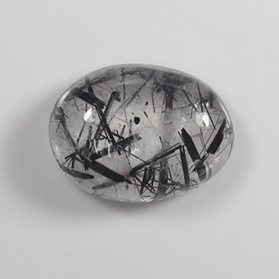 แก้วขนเหล็ก (Tourmalinated Quartz) 10.60 กะรัต ไหมสีดำเข้มชัด เนื้อพลอยใส