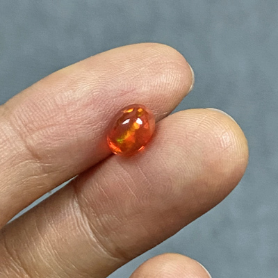 **ขายแล้ว**โอปอลไฟ (Fire Opal) จากเม็กซิโก 1.00 กะรัต สีส้มอมแดง