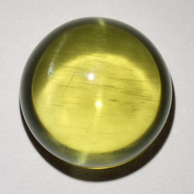 อะพาไทท์ตาแมว (Cat's eye Apatite) 11.55 กะรัต เม็ดโต เนื้อใส ตาแมวอ่อนๆ เม็ดโต