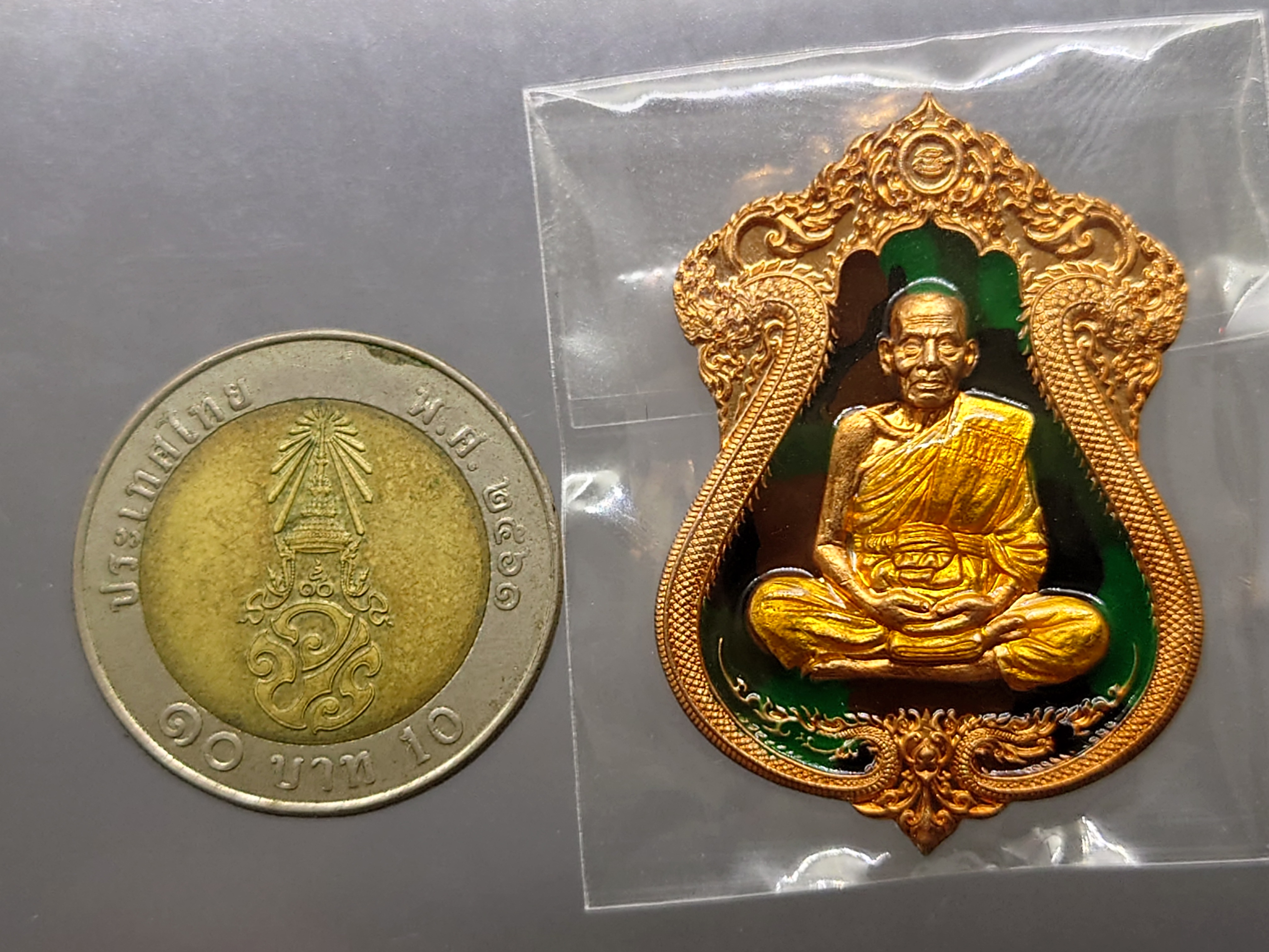 ทรัพย์เศรษฐี เนื้อทองแดงมันปู ลงยาพื้นเขียว ลงยาจีวร หลวงพ่อพัฒน์ วัดห้วยด้วน โคท 298 ซีลเดิม