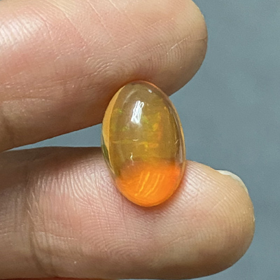 **ขายแล้ว**โอปอลไฟ (Fire Opal) จากเม็กซิโก 3.20 กะรัต สีส้มอมเหลือง มีเหลือบอ่อนๆ