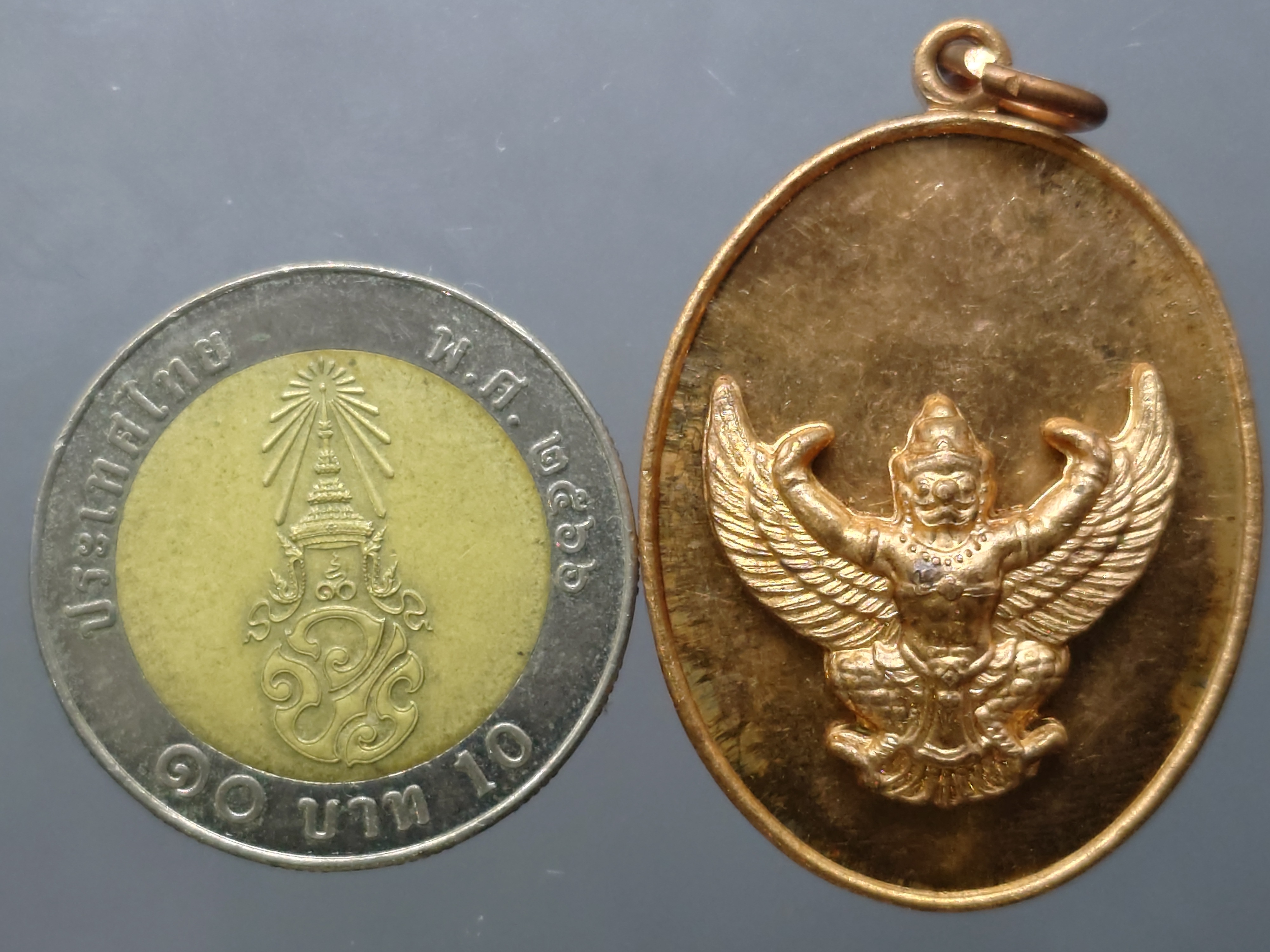 พญาครุฑ หัวใจเศรษฐี เนื้อทองแดง หลวงพ่อวราห์ วัดโพธิทอง บางมด ปี 2552