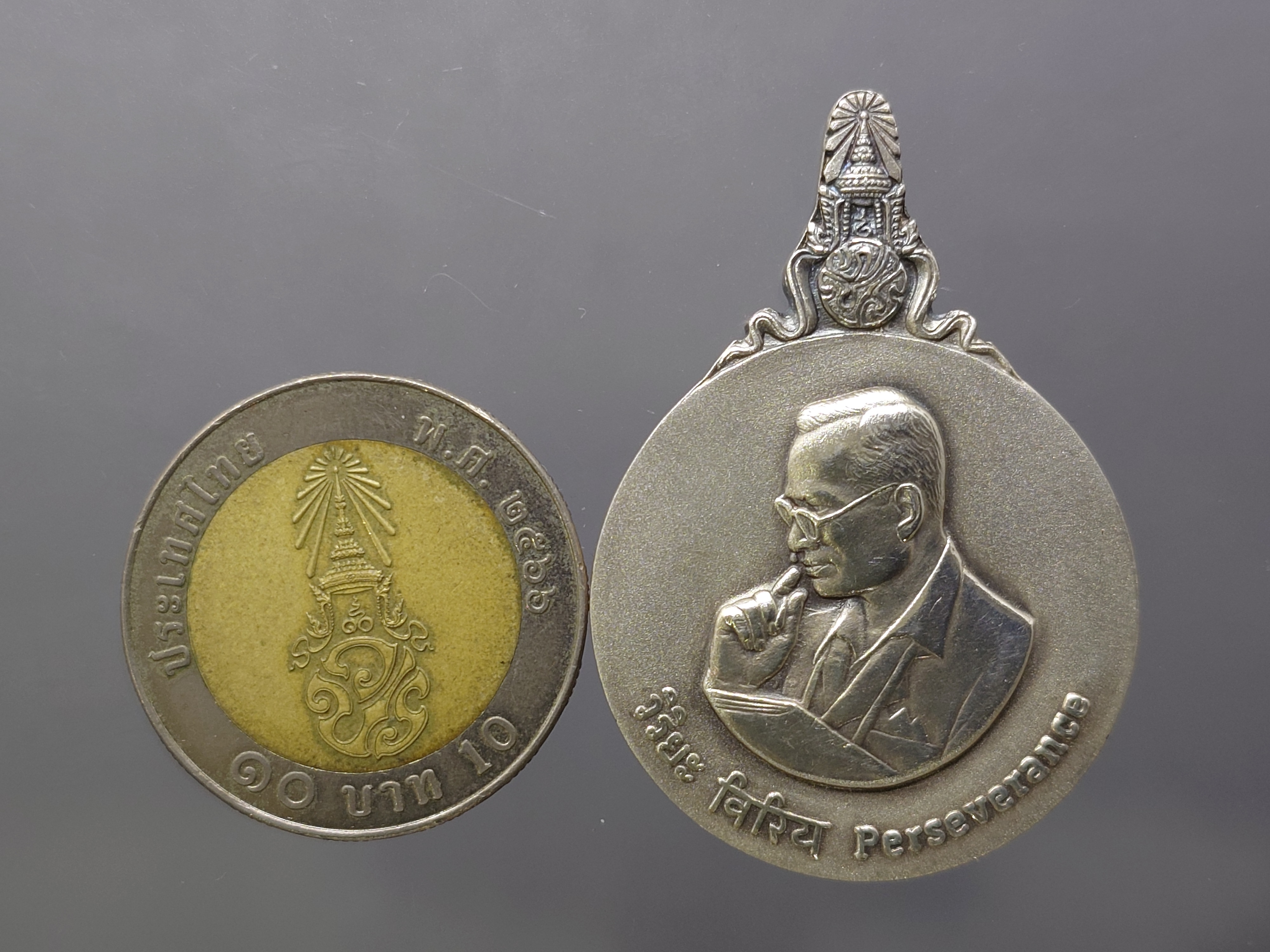 พระมหาชนก เนื้อเงิน พิมพ์ใหญ่ บล๊อก ป ขาด มีแต่เหรียญ ไม่มีหนังสือ