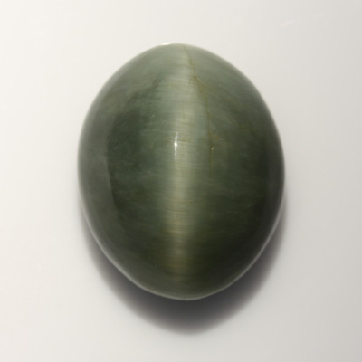 **ขายแล้ว**ควอตซ์ตาแมว (Cat's eye Quartz) 6.21 กะรัต สีเขียวอมเทา รูปไข่